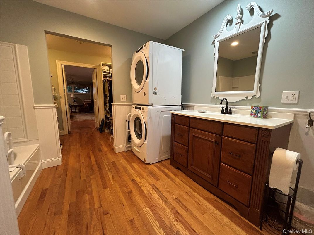 Bathroom, Dual Sink Vanities, Interior, Utility Closets, Washer, Wood Texture Flooring