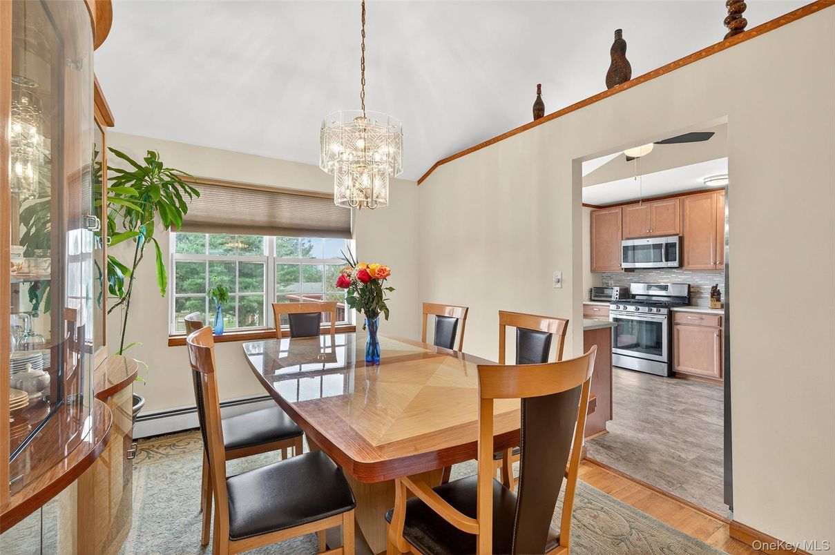 Chandelier, Dining room, Interior, Kitchen, Stainless Steel Appliances, Wood Texture Flooring