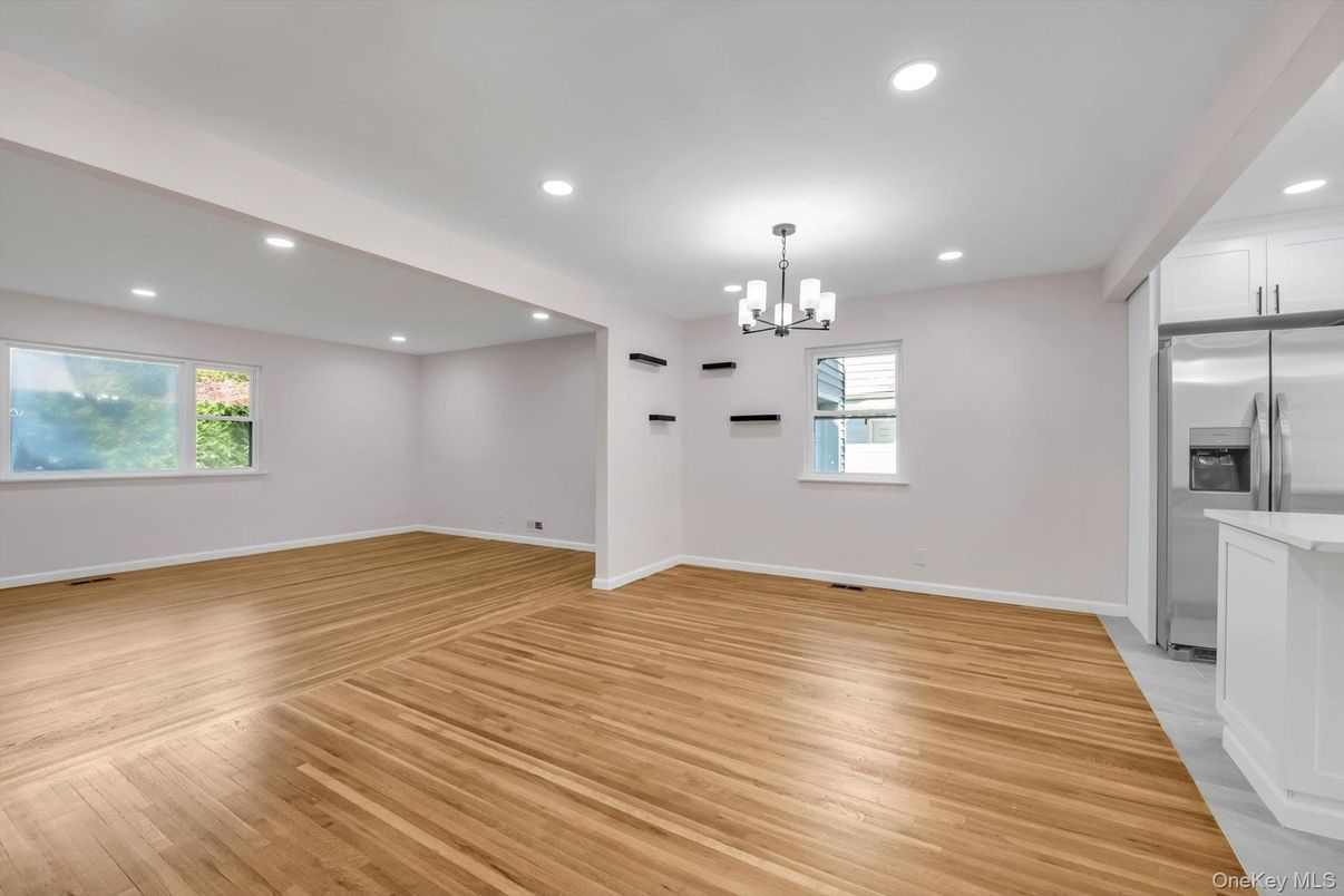 Chandelier, Empty room, Interior, Kitchen, Recessed Lighting, Stainless Steel Appliances, Wood Texture Flooring
