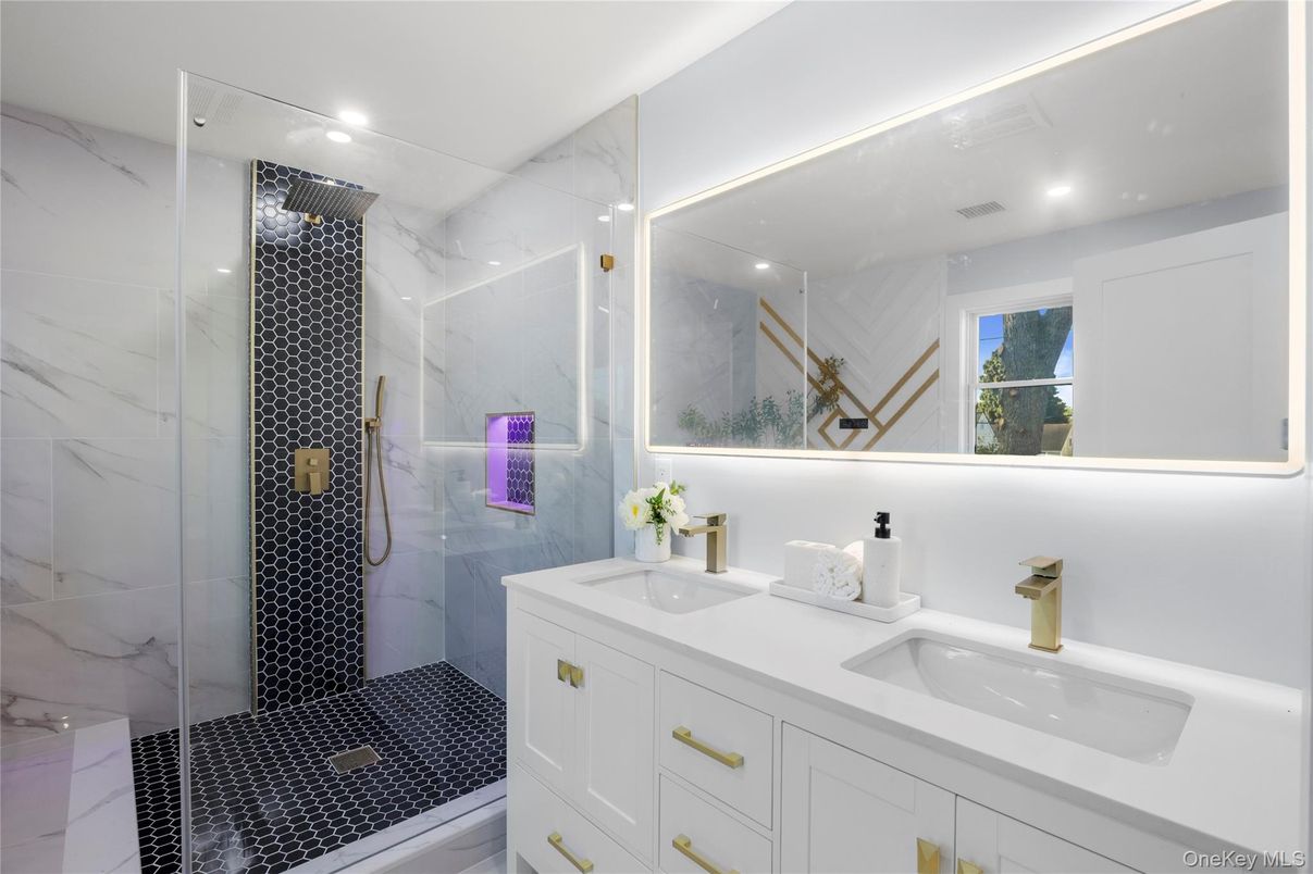 Bathroom, Dual Sink Vanities, Glass Shower, Interior, Marble Walls, Recessed Lighting