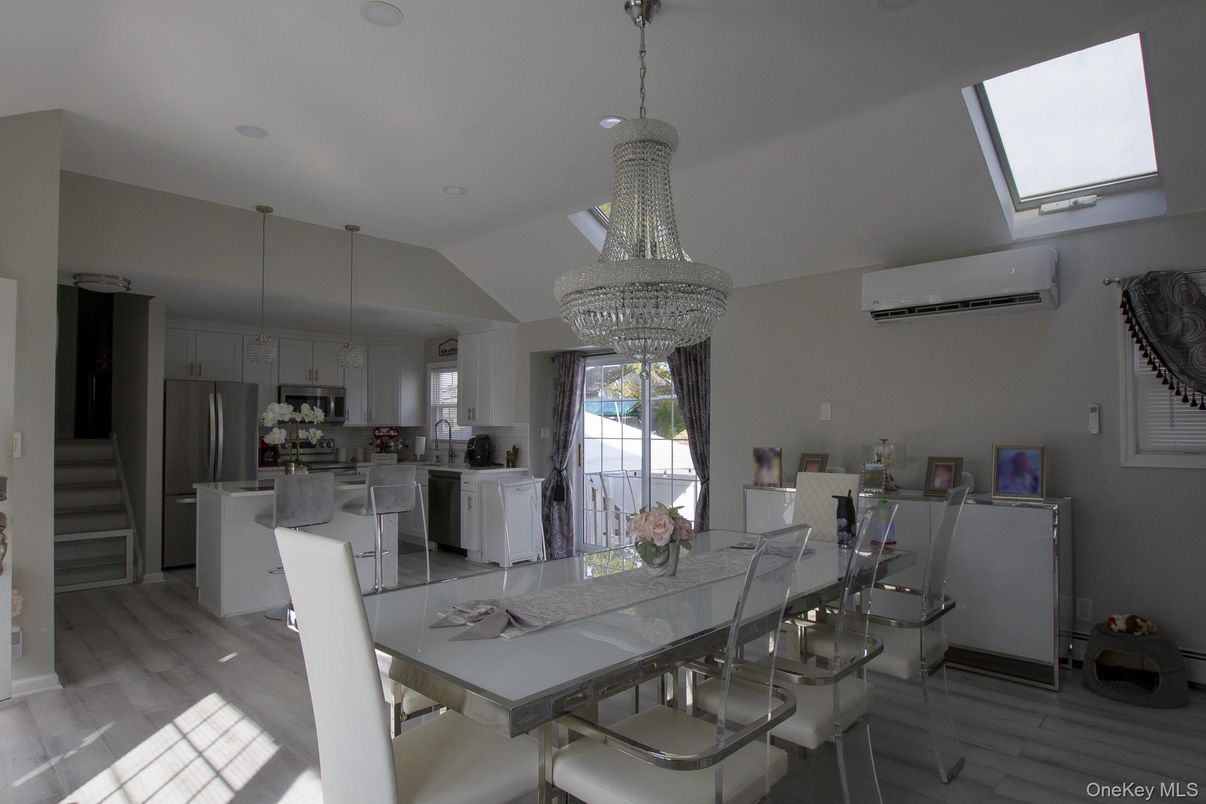 Chandelier, Dining room, Interior, Kitchen, Recessed Lighting, Stainless Steel Appliances, Wood Texture Flooring
