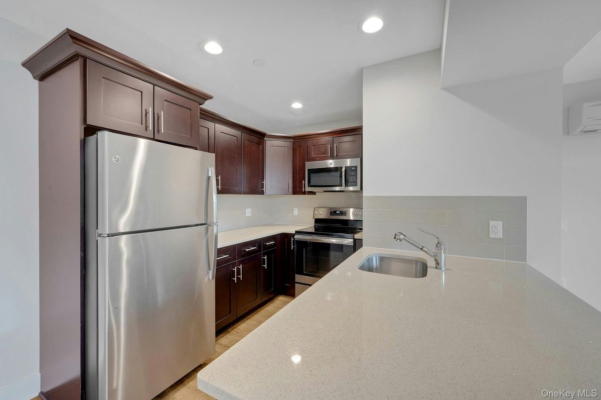 Interior, Kitchen, Recessed Lighting, Stainless Steel Appliances, Wood Texture Flooring