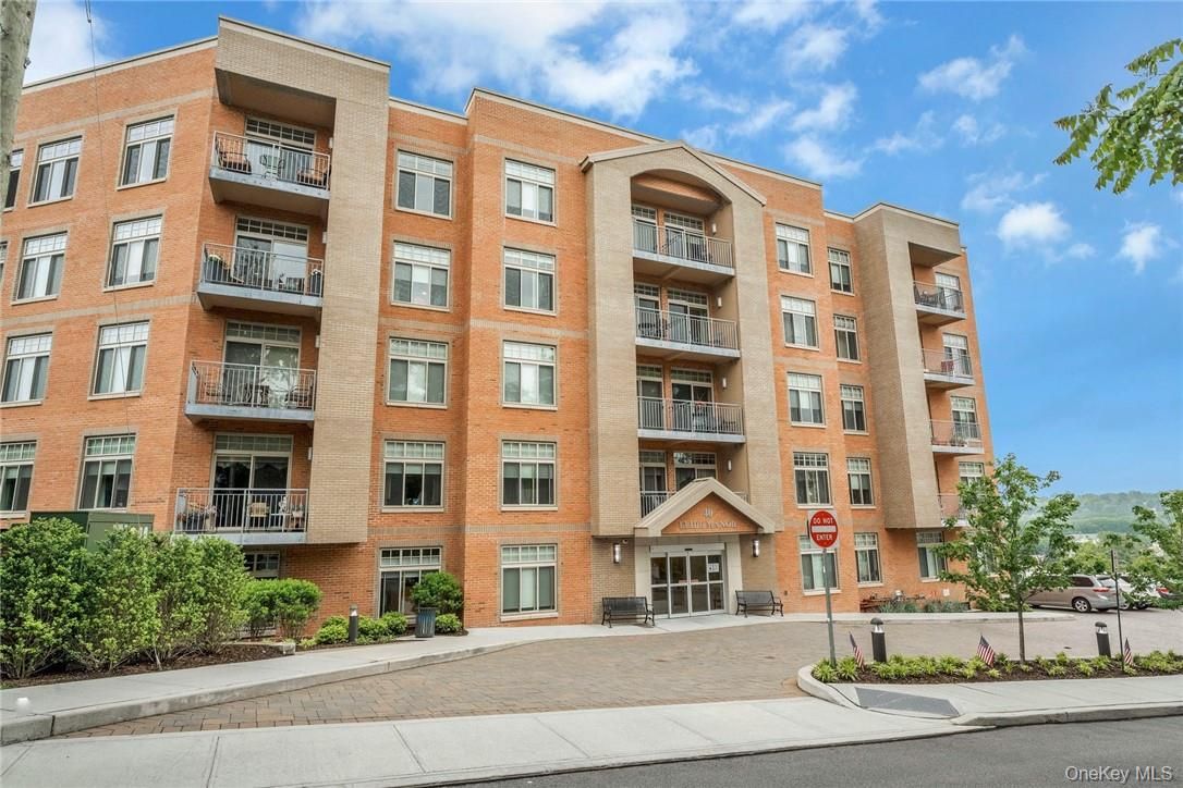 Exterior, Facade, Brick Facade, Condo Building