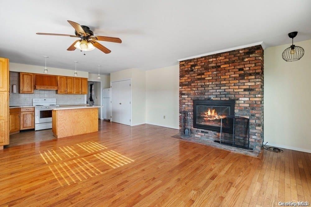 Fireplace, Interior, Kitchen, Pendant Lights, Stone Walls, Wood Texture Flooring