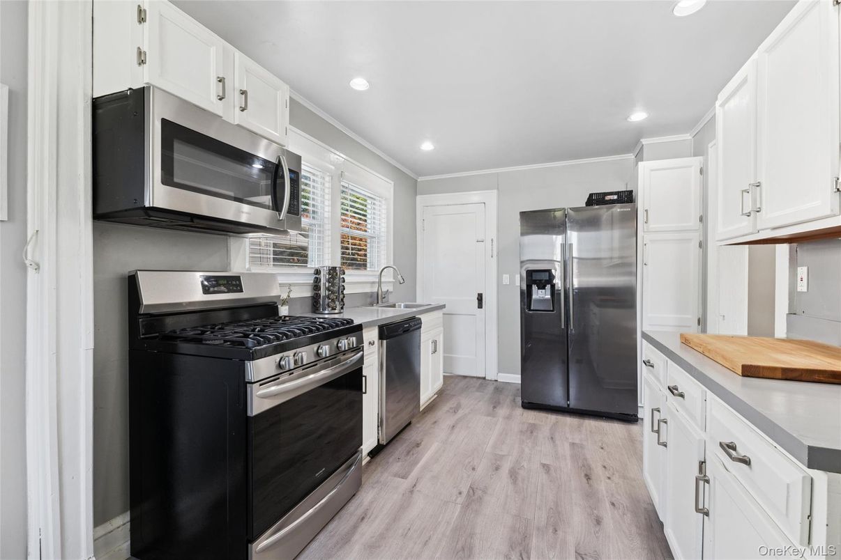 Interior, Kitchen, Recessed Lighting, Stainless Steel Appliances, Wood Texture Flooring