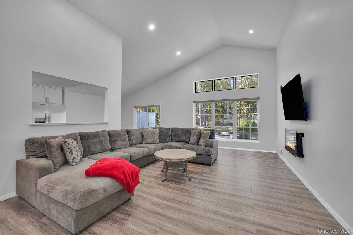 Fireplace, Interior, Living room, Recessed Lighting, Wood Texture Flooring