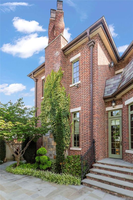 Exterior, Facade, Brick Facade, Solar Panels, Rowhouse