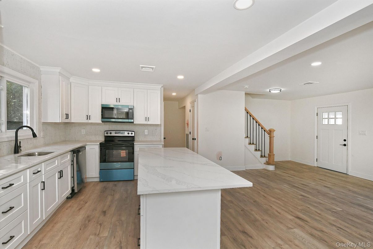 Interior, Kitchen, Recessed Lighting, Stainless Steel Appliances, Wood Texture Flooring