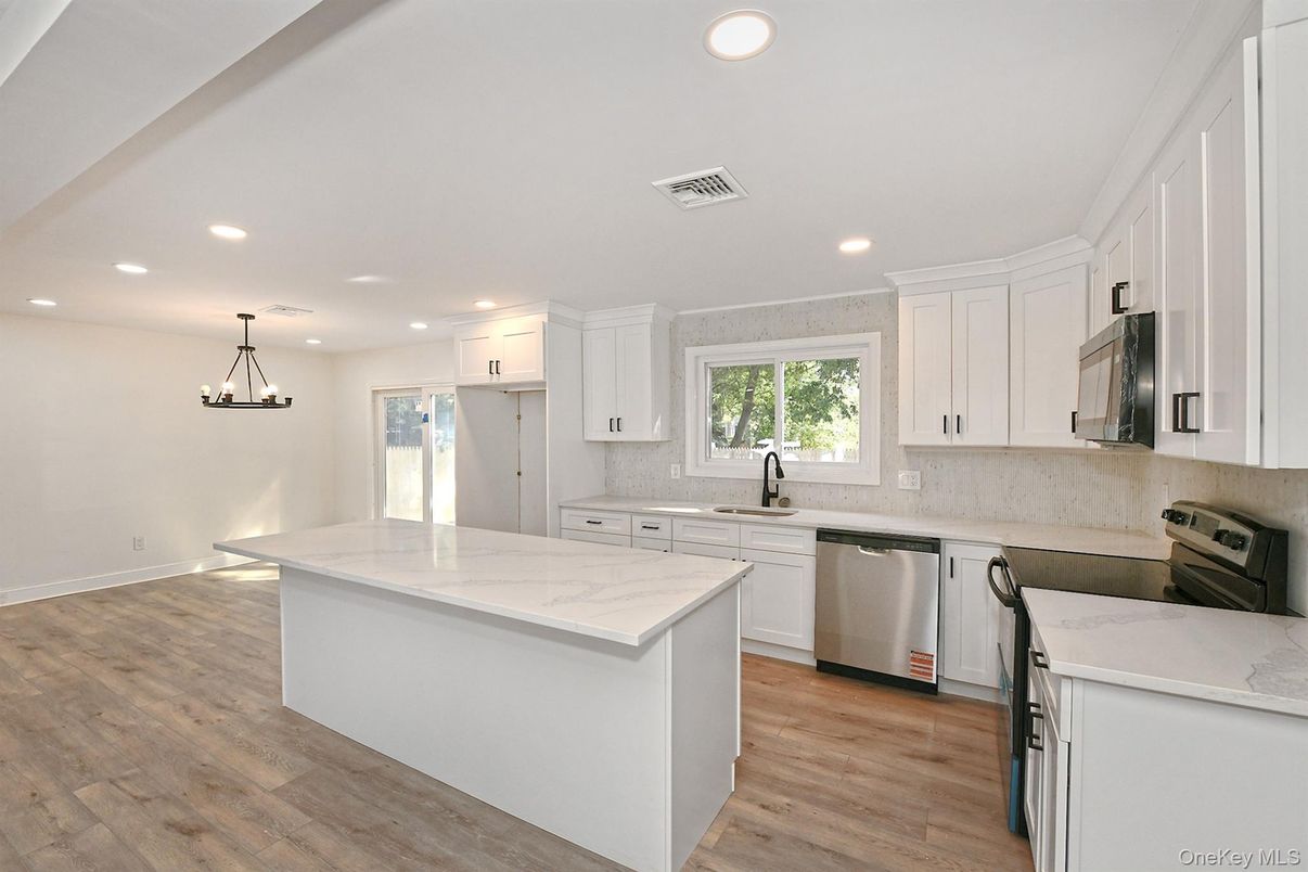 Interior, Kitchen, Pendant Lights, Recessed Lighting, Stainless Steel Appliances, Wood Texture Flooring