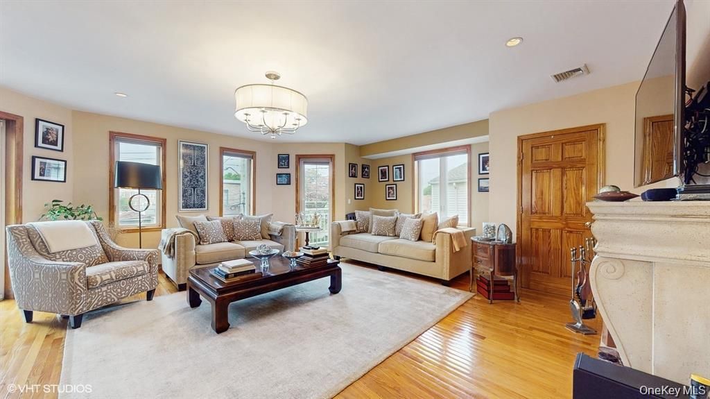 Chandelier, Fireplace, Interior, Living room, Recessed Lighting, Wood Texture Flooring