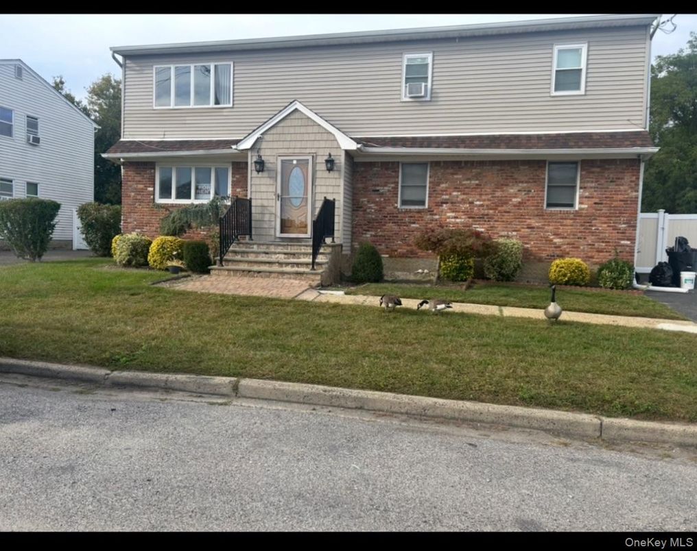 Exterior, Facade, Brick Facade, Split Level