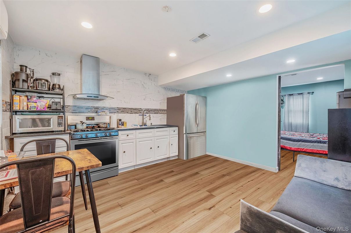 Interior, Kitchen, Marble Walls, Recessed Lighting, Wood Texture Flooring