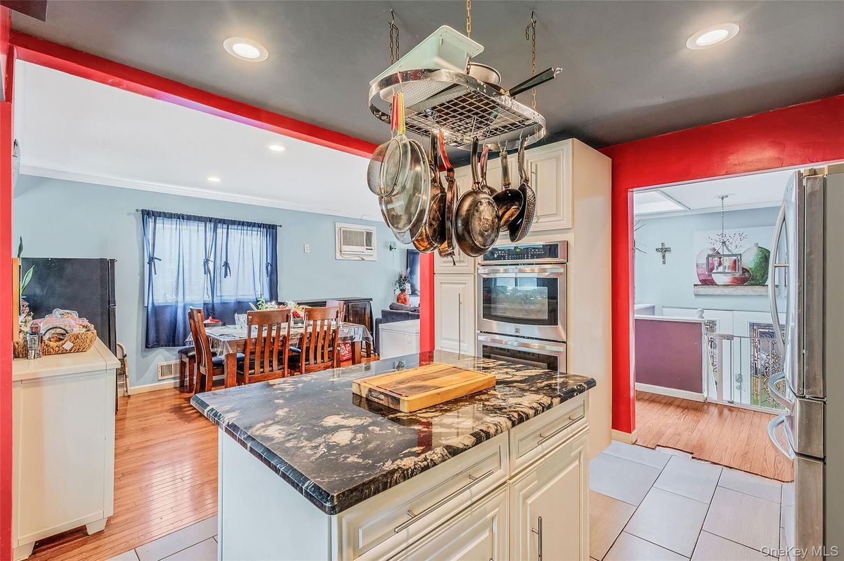 Dining room, Interior, Kitchen, Recessed Lighting, Stainless Steel Appliances, Wood Texture Flooring