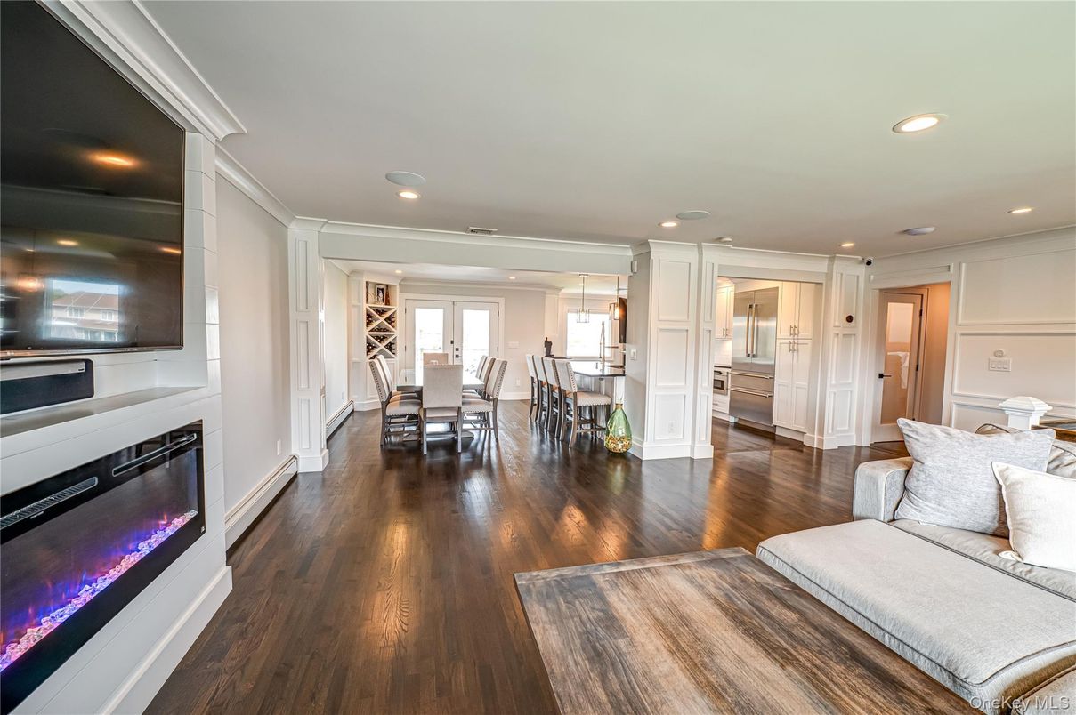 Dining room, Fireplace, Interior, Pendant Lights, Recessed Lighting, Wood Texture Flooring