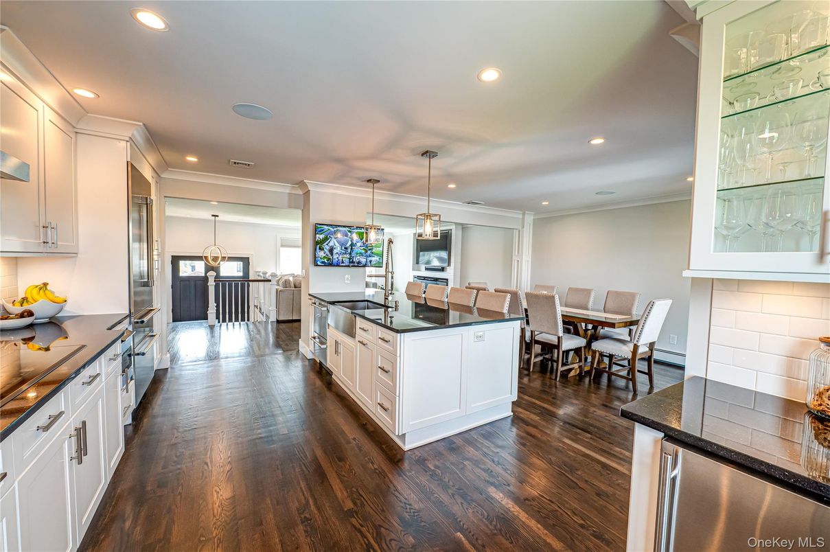 Dining room, Interior, Kitchen, Pendant Lights, Recessed Lighting, Stainless Steel Appliances, Wood Texture Flooring
