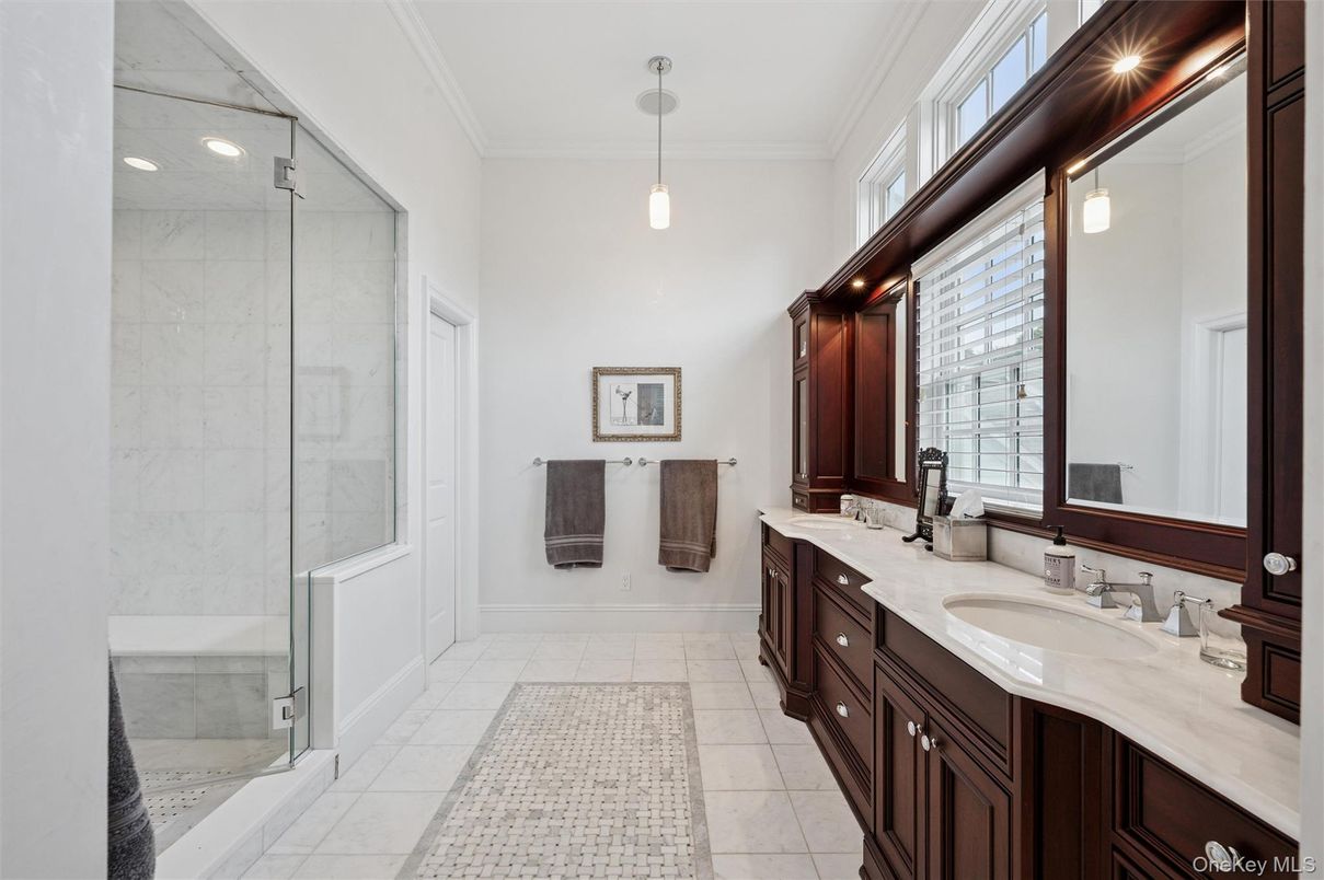 Bathroom, Dual Sink Vanities, Glass Shower, Interior, Marble Walls, Pendant Lights, Recessed Lighting