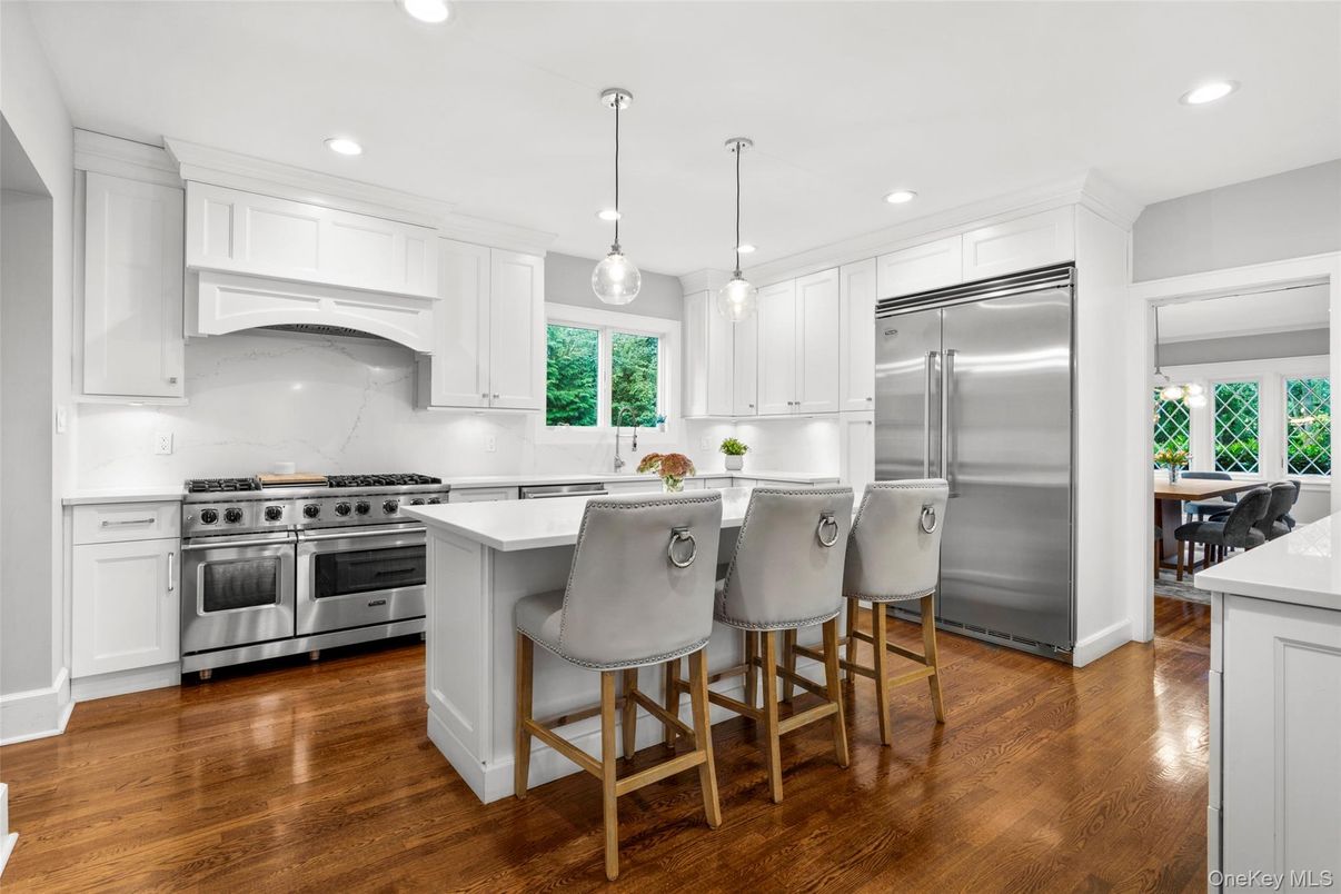 Dining room, Interior, Kitchen, Pendant Lights, Recessed Lighting, Stainless Steel Appliances, Wood Texture Flooring