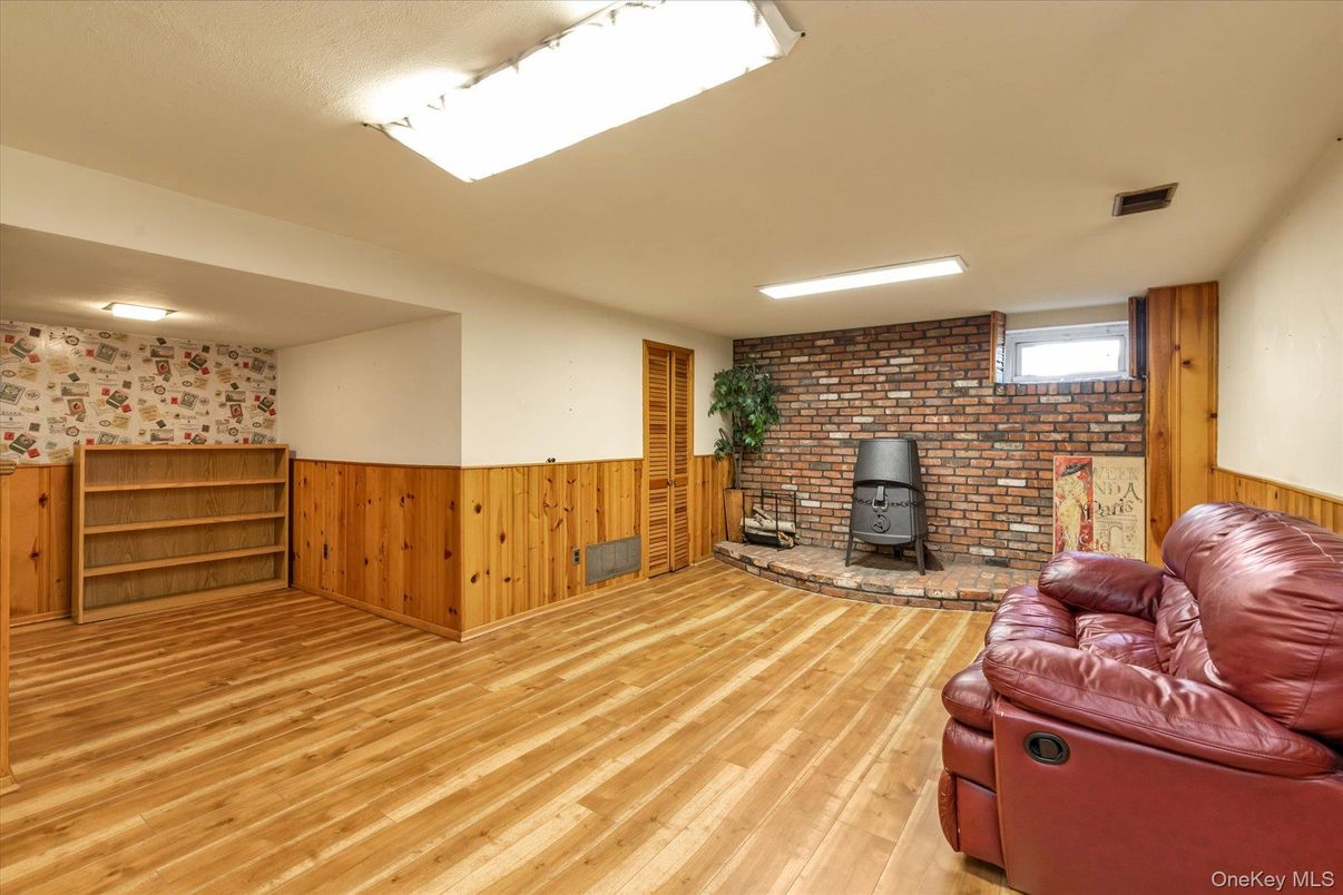Fireplace, Interior, Recessed Lighting, Stone Walls, Wood Texture Flooring