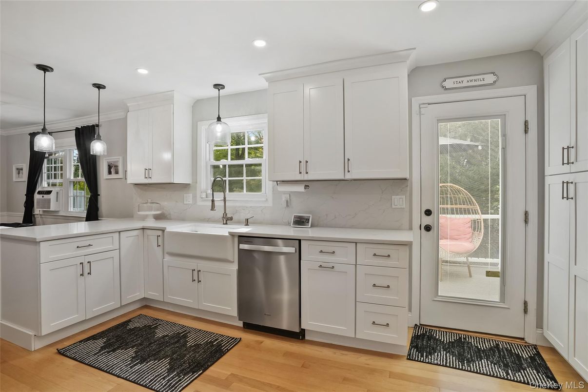 Interior, Kitchen, Marble Walls, Pendant Lights, Recessed Lighting, Stainless Steel Appliances, Wood Texture Flooring