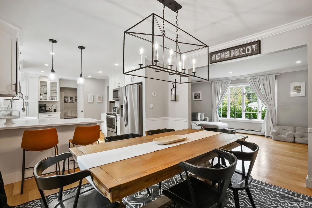 Dining room, Interior, Kitchen, Pendant Lights, Recessed Lighting, Stainless Steel Appliances, Wood Texture Flooring