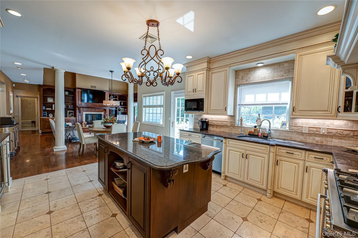 Chandelier, Dining room, Interior, Kitchen, Recessed Lighting, Stainless Steel Appliances, Wood Texture Flooring