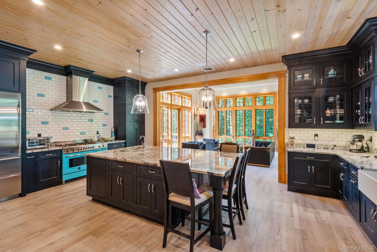 Dining room, Interior, Kitchen, Pendant Lights, Recessed Lighting, Stainless Steel Appliances, Wooden Ceilings, Wood Texture Flooring