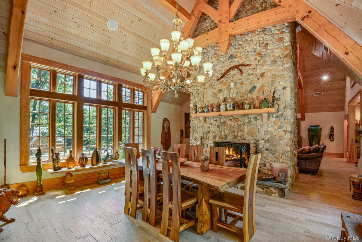 Chandelier, Dining room, Fireplace, Interior, Stone Walls, Wooden Beams, Wooden Ceilings, Wood Texture Flooring