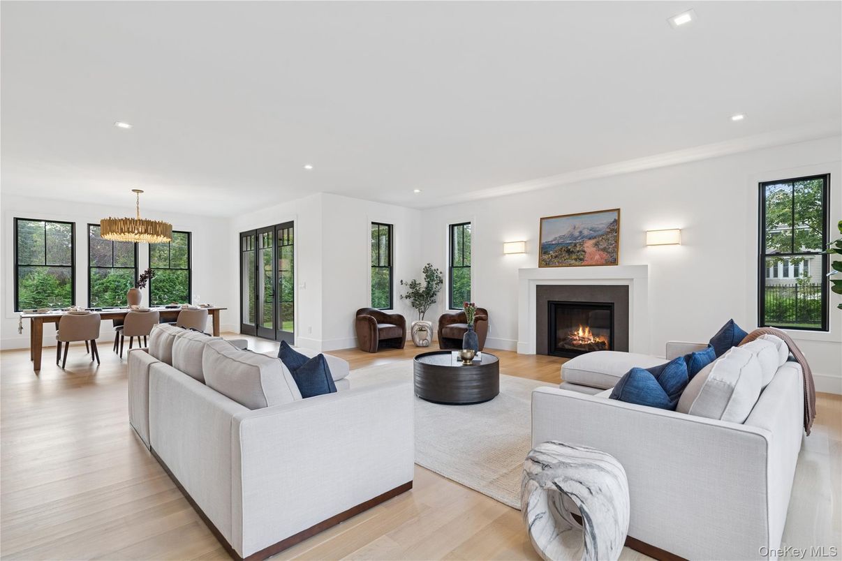 Chandelier, Dining room, Fireplace, Interior, Living room, Recessed Lighting, Wood Texture Flooring