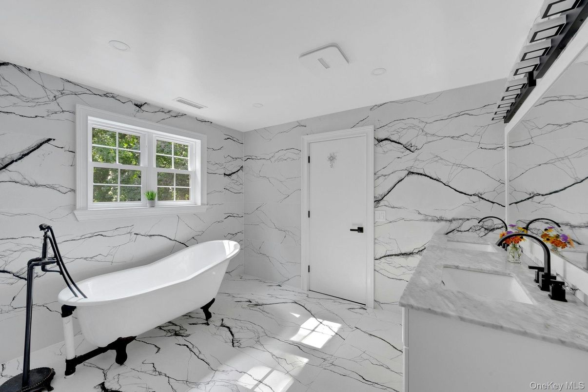Bathroom, Dual Sink Vanities, Free Standing Baths, Interior, Marble, Marble Walls, Recessed Lighting
