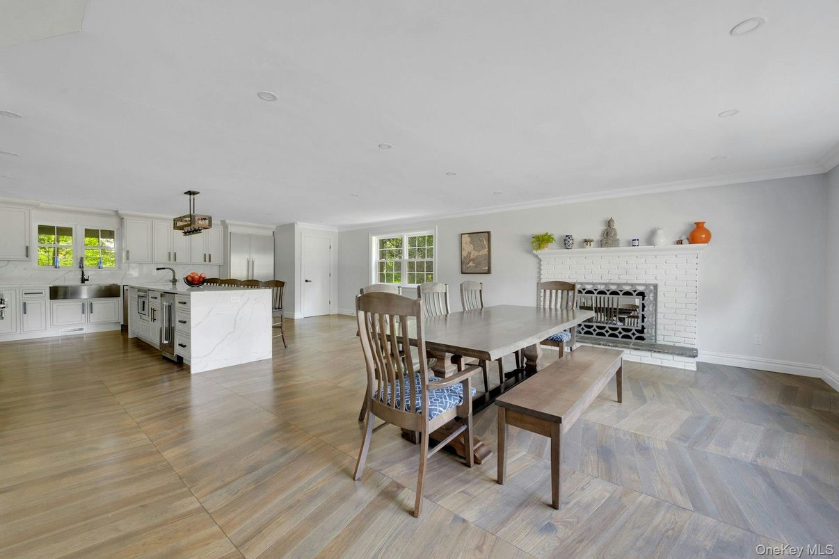 Dining room, Fireplace, Interior, Kitchen, Recessed Lighting, Wood Texture Flooring
