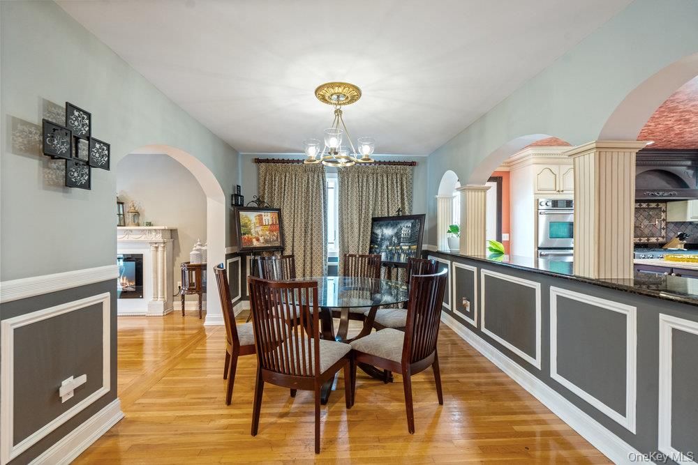 Chandelier, Dining room, Fireplace, Interior, Kitchen, Wood Texture Flooring