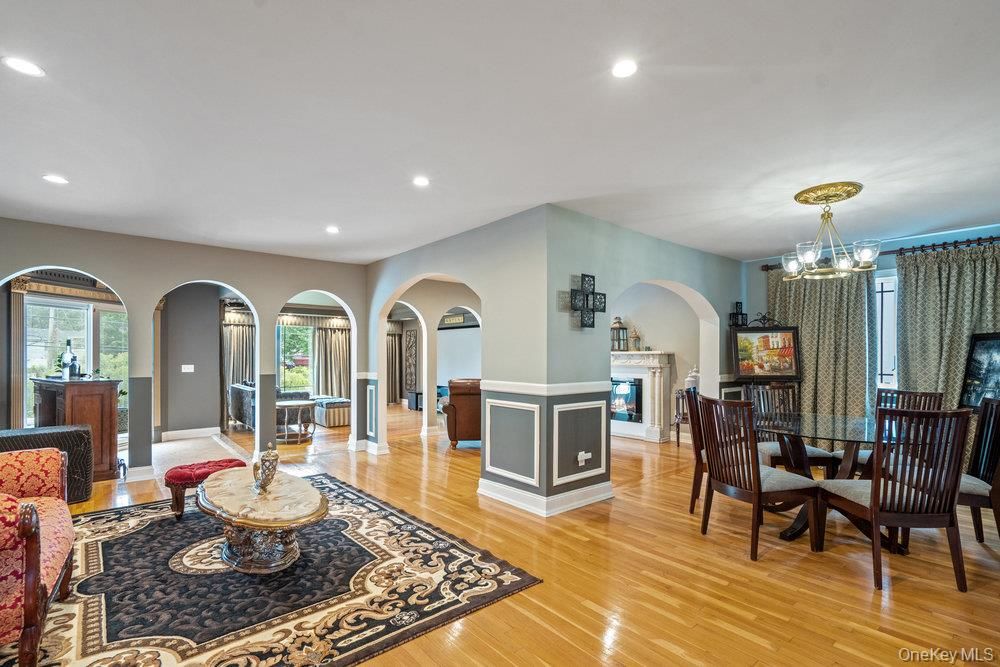Chandelier, Dining room, Fireplace, Interior, Recessed Lighting, Wood Texture Flooring