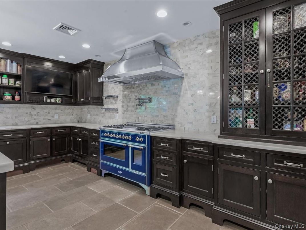 Interior, Kitchen, Marble Walls, Recessed Lighting, Stainless Steel Appliances