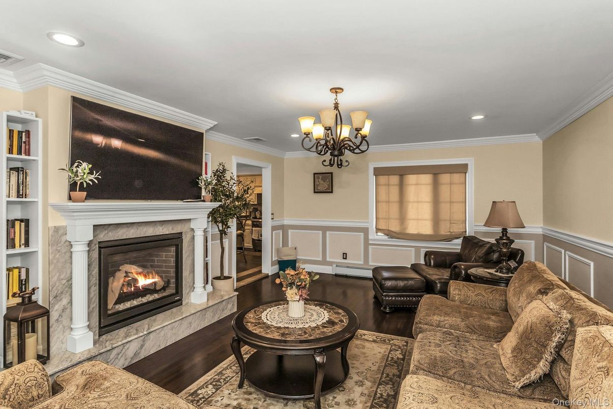Chandelier, Fireplace, Interior, Living room, Recessed Lighting, Wood Texture Flooring