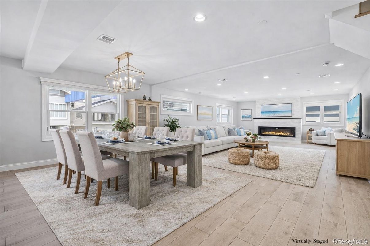 Dining room, Fireplace, Interior, Living room, Pendant Lights, Recessed Lighting, Wood Texture Flooring