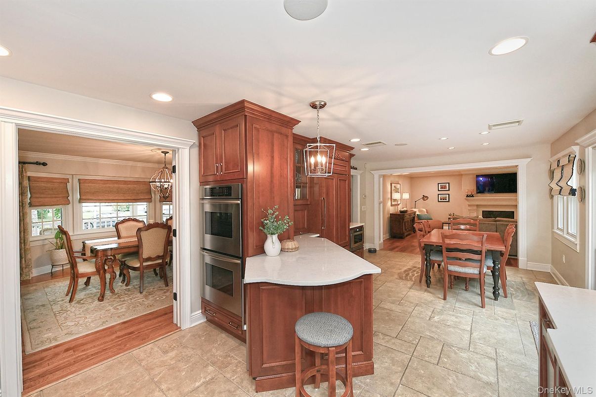 Dining room, Fireplace, Interior, Kitchen, Pendant Lights, Recessed Lighting, Stainless Steel Appliances