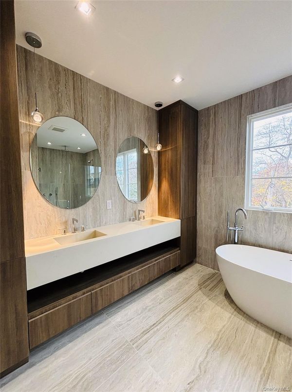 Bathroom, Dual Sink Vanities, Free Standing Baths, Interior, Pendant Lights, Recessed Lighting, Wooden Walls