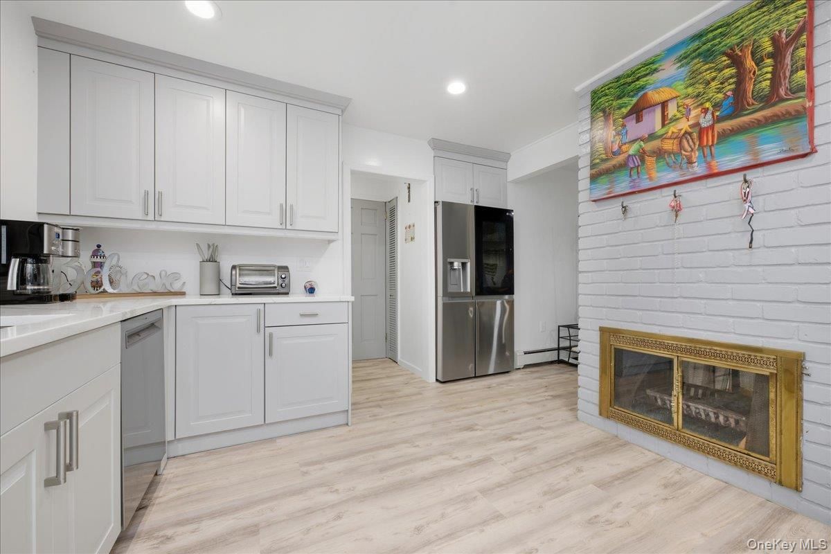 Fireplace, Interior, Kitchen, Recessed Lighting, Wood Texture Flooring