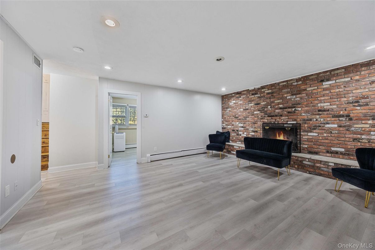 Fireplace, Interior, Recessed Lighting, Stone Walls, Wood Texture Flooring