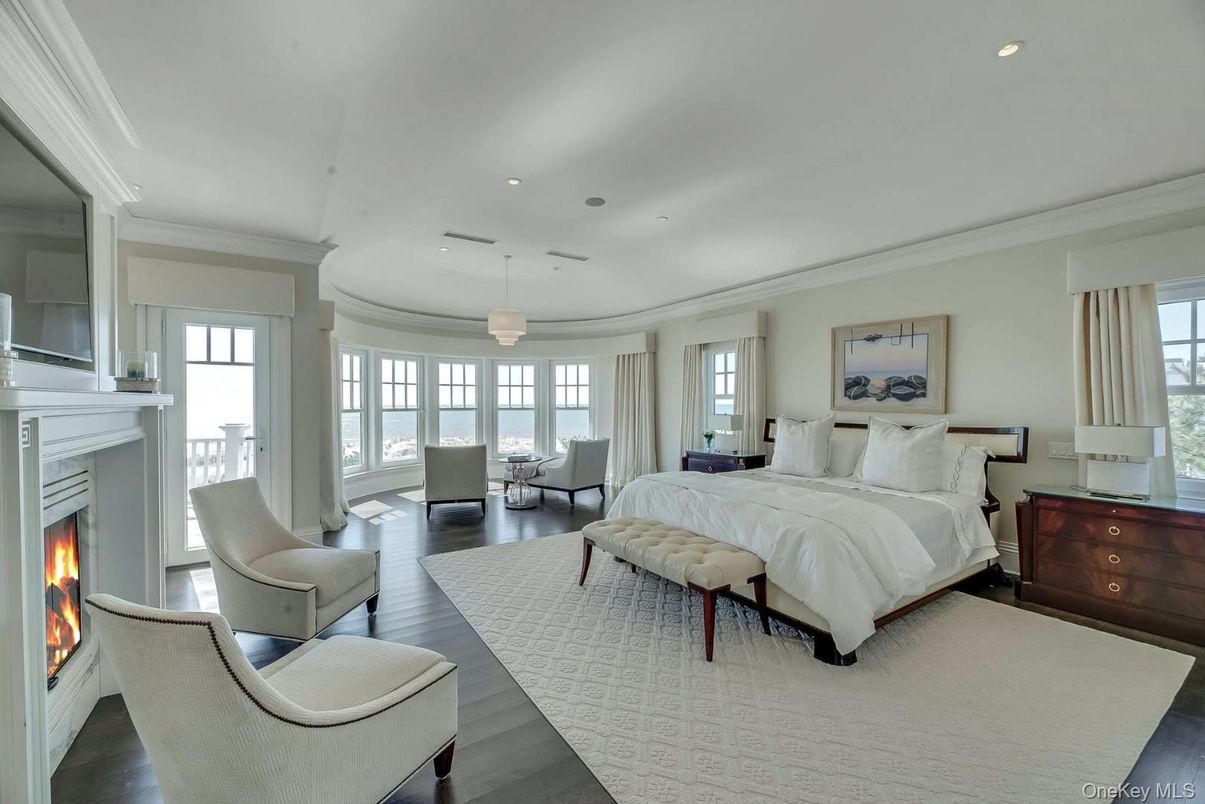 Bedroom, Fireplace, Interior, Pendant Lights, Recessed Lighting, Wood Texture Flooring