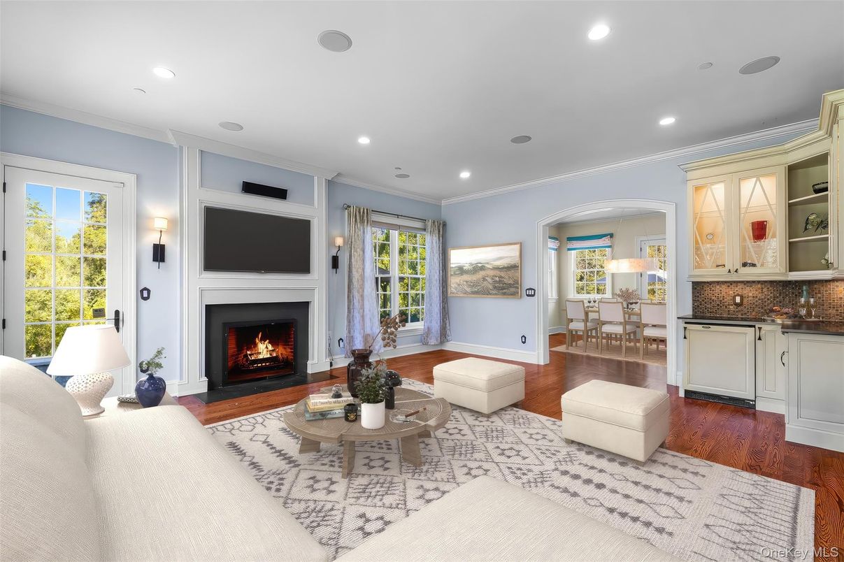 Dining room, Fireplace, Interior, Living room, Recessed Lighting, Wood Texture Flooring