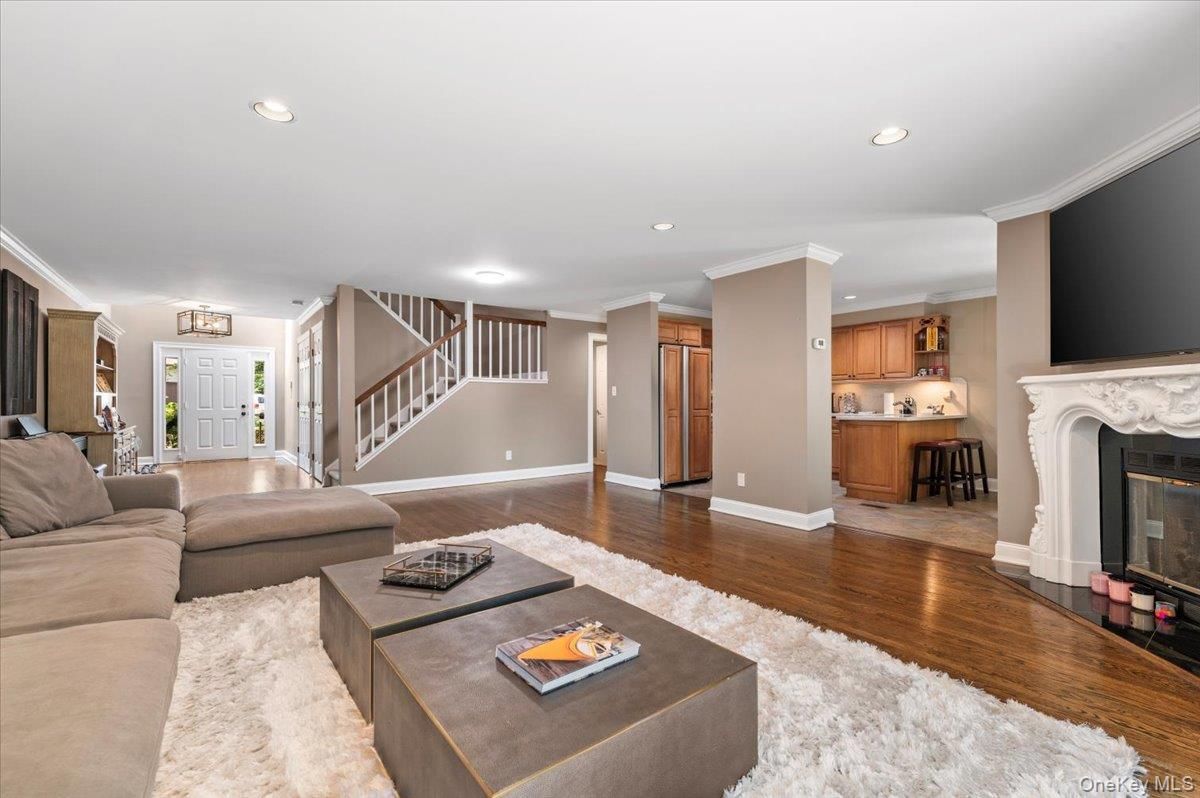 Fireplace, Interior, Kitchen, Living room, Recessed Lighting, Wood Texture Flooring