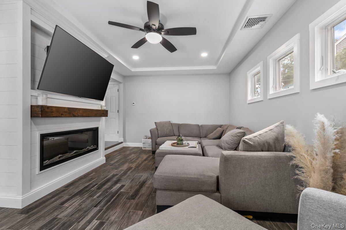 Fireplace, Interior, Living room, Recessed Lighting, Wood Texture Flooring