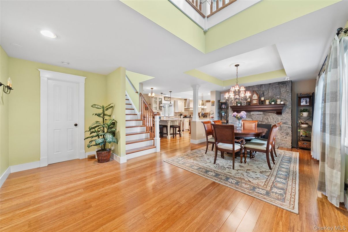 Chandelier, Dining room, Fireplace, Interior, Recessed Lighting, Wood Texture Flooring