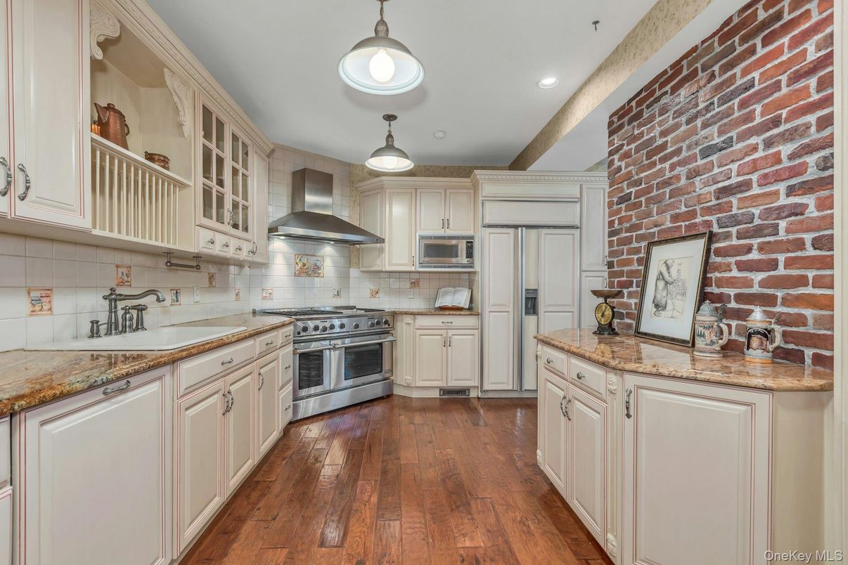 Interior, Kitchen, Pendant Lights, Recessed Lighting, Stainless Steel Appliances, Stone Walls, Wood Texture Flooring