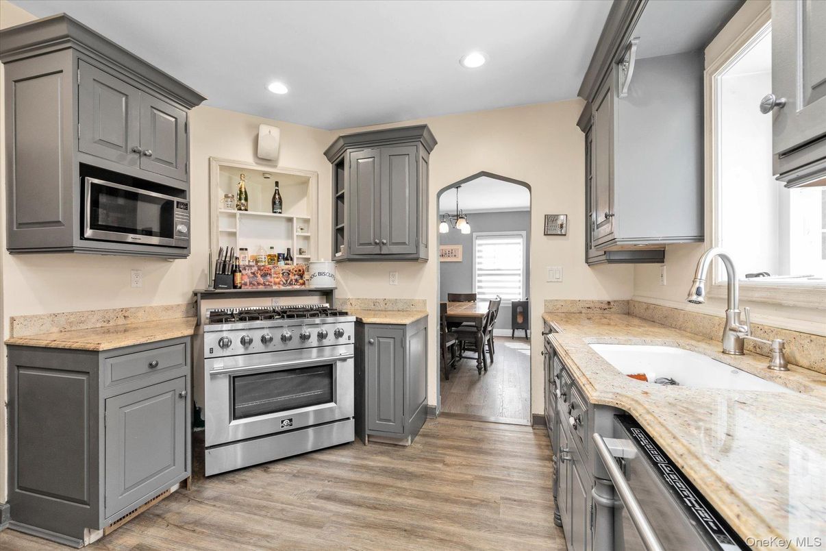 Dining room, Interior, Kitchen, Recessed Lighting, Stainless Steel Appliances, Wood Texture Flooring