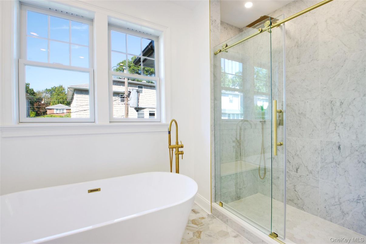 Bathroom, Free Standing Baths, Glass Shower, Interior, Marble Walls, Recessed Lighting