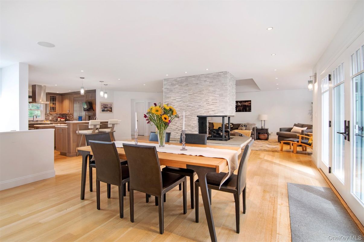 Dining room, Fireplace, Interior, Kitchen, Living room, Pendant Lights, Recessed Lighting, Stone Walls, Wood Texture Flooring