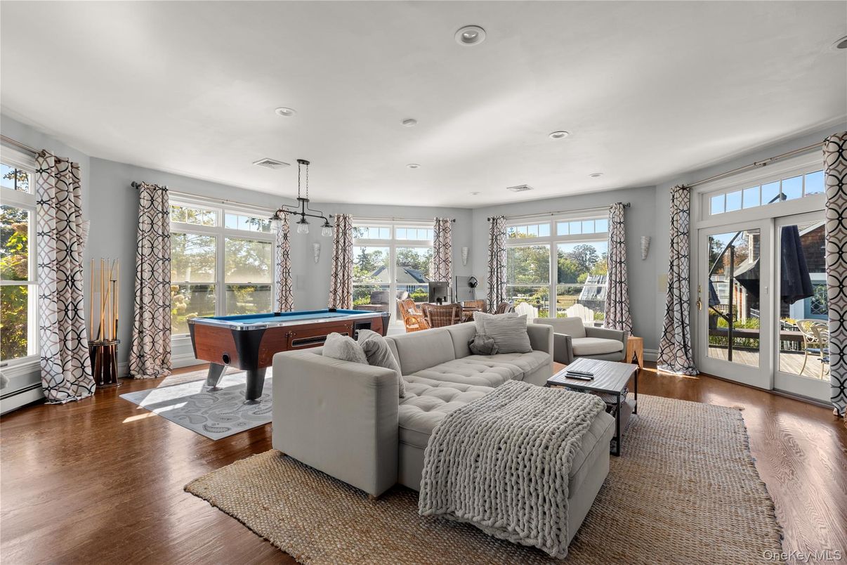 Billiard Table, Game Room, Interior, Living room, Pendant Lights, Recessed Lighting, Wood Texture Flooring