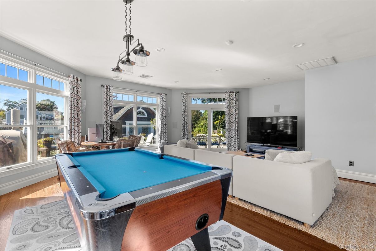 Billiard Table, Game Room, Interior, Living room, Pendant Lights, Recessed Lighting, Wood Texture Flooring